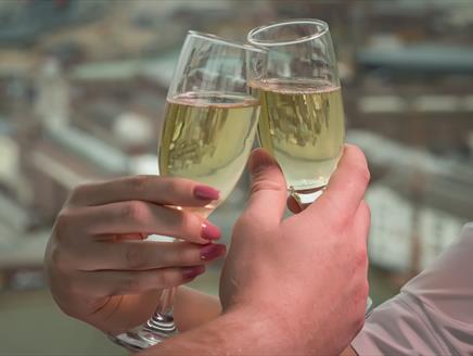 Love is in the air at the Spinnaker Tower - couple enjoying sparkling wine