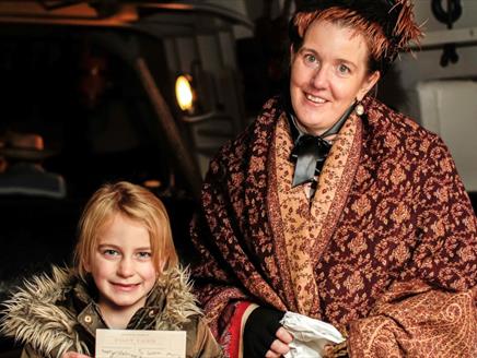 Woman and child happy about Chritsmas