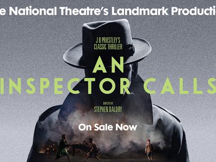 Silhouette of man in detective coat and hat