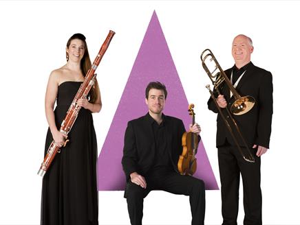 Three members of the Bournemouth Symphony Orchestra with their instruments