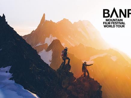 Poster for the Banff Mountain Film Festival World Tour 2025, featuring two climbers on a mountain