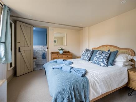 A bedroom at Carrington Stables - a New Forest Holiday Cottage