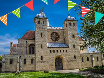 Photograph of Portsmouth Cathedral overlaid with an illustration of bunting