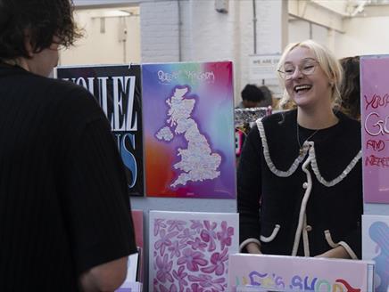 A trader and a punter at a 'Craft & Flea' Makers Market