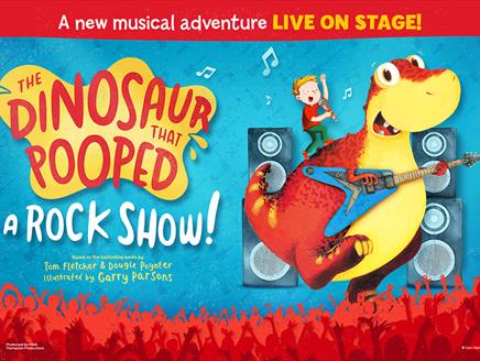 A cartoon drawing of a boy stood on a yellow and red dinosaur which is playing a guitar.