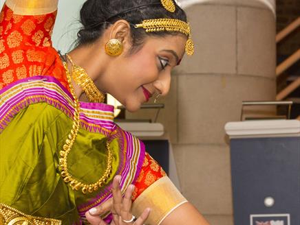 Woman dancing at diwali