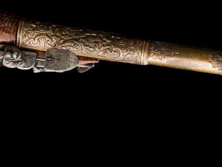 A Polite Exchange of Bullets at the Winchester City Museum - old fashioned pistol which is smoking