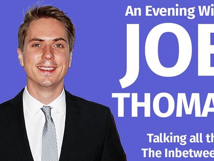 Poster for An Evening With Joe Thomas, featuring the actor/comedian in a suit against a purple background