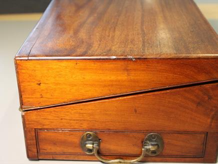 Jane Austen's Travelling Writing Desk on display at a space, Southampton