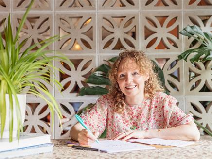 Calligraphy tutor Laura Edralin leads a mindful calligraphy session at Jane Austen's House