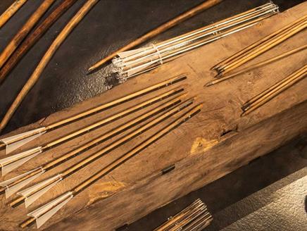 Photograph showing arrows on display at The Mary Rose museum