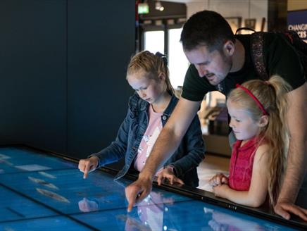 Exploring the HMS Gallery with dad
