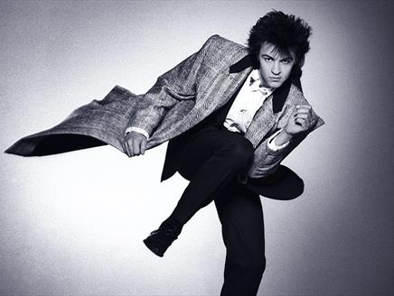 Black and white picture of singer Paul Young from his 1980s