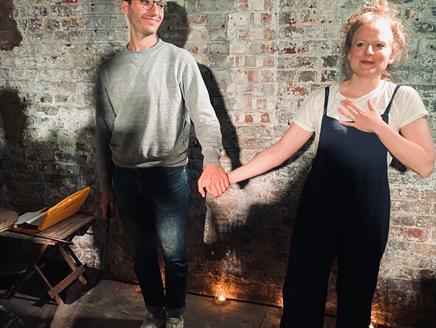 Actors holding hands