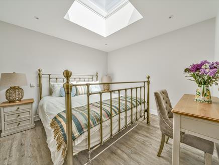 A bedroom at The Potting Shed - a New Forest Holiday Cottage