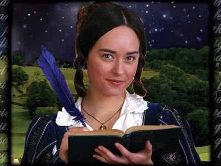 Lady writing into a book with countryside in background