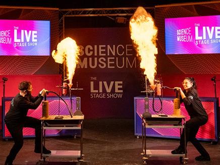 Photograph of flames being lit at a Science Museum Live show
