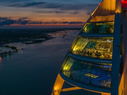 Aerial photograph of Spinnaker Tower by night