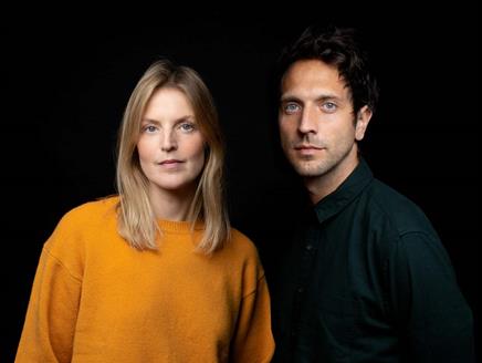 Lauren Kinsella and Matt Robinson look towards the camera.