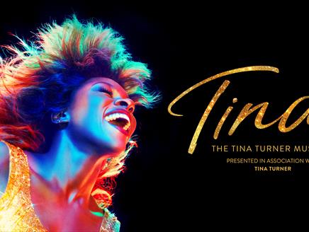 Tina Tuner facing right mid song