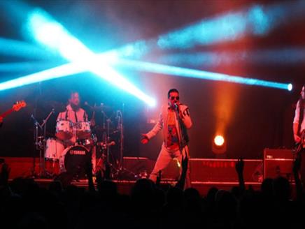 picture of Queen tribute band performing.