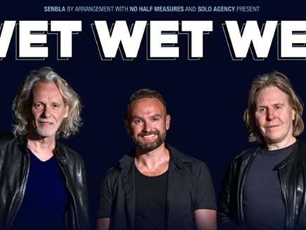 Poster featuring Wet Wet Wet's three band members.