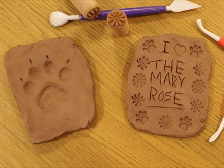 Paw-print tiles made at The Mary Rose museum in Portsmouth