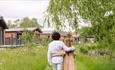 Couple walking through Green Hill Farm