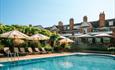 Outside swimming pool and decking area at Chewton Glen Hotel & Spa