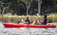 Couple in double kayak with New Forest Activites
