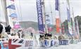 Our Isles and Oceans team leads Parade of Sail out of Oban - last stage in Clipper 2023-24 Race 3 photo credit Martin Shields