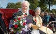 Queen Victoria with flower girl
