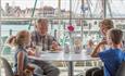 Family enjoying the café at Emirates spinnaker Tower