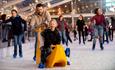 Family with a banana-shaped skate aid - credit Ice Skate Portsmouth and Vernon Nash