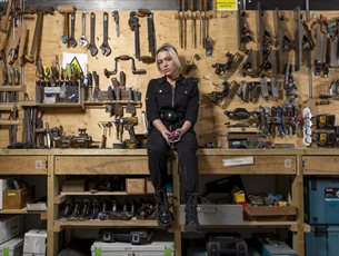 Emily Ball, boatkeeper assistant, with her tools