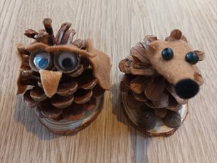 Picture of pine cone owl and squirrel as a superhero 