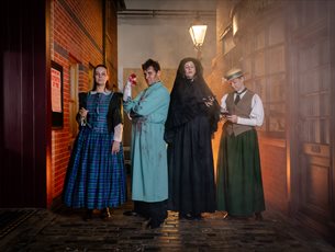 Actors in spooky costumes at Milestones Museum