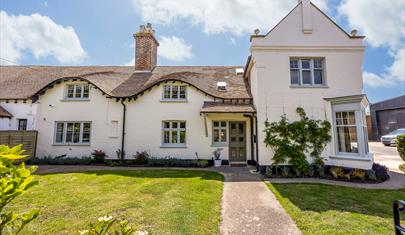 The exterior of Carrington Farmhouse - a New Forest Holiday Cottage