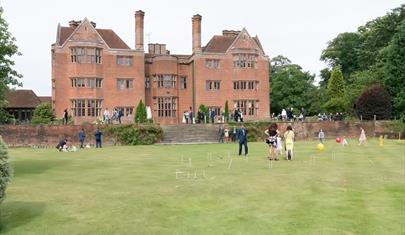 New Place Hotel playing croquet on lawn at wedding