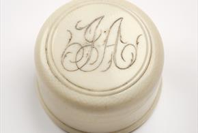 The lid of Jane Austen's sewing case, personalised with her initials