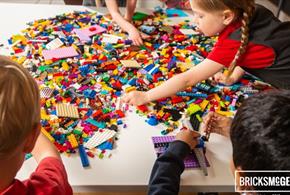 Children playing with LEGO at a Bricks McGee event