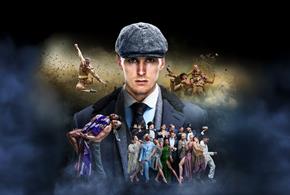 Man in flat cap in centre with dancers around him dressed as World War 1 soldiers
