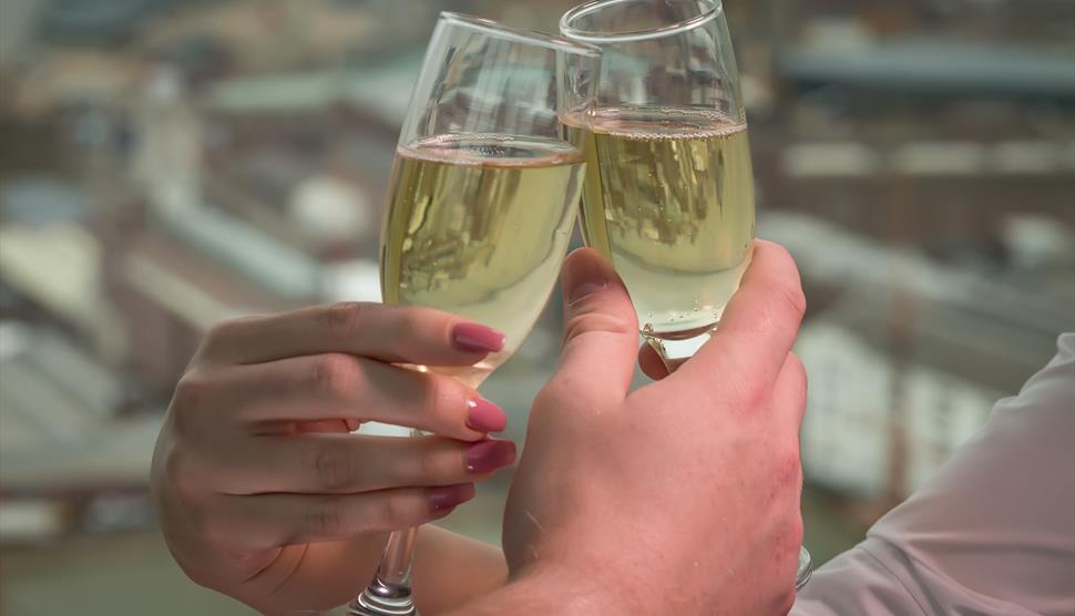 Love is in the air at the Spinnaker Tower - couple enjoying sparkling wine