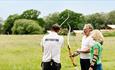 Couple learn archery at Green Hill Farm