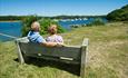 Couple taking in the view of Beaulieu River at Bucklers Hard