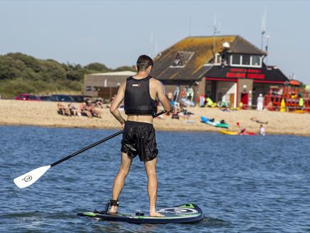 Stand up paddleboarding at Stokes Bay with Stoked Watersports