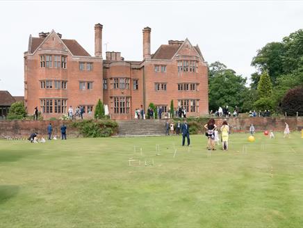 New Place Hotel playing croquet on lawn at wedding