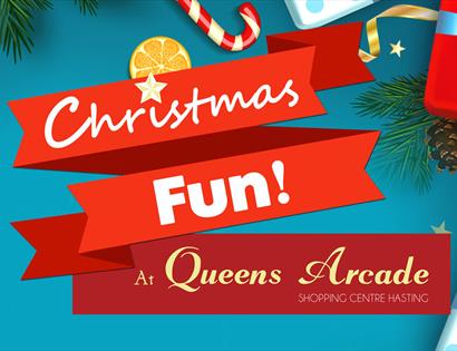 A poster with a blue background, christmas gifts and red ribbon containing the text 'Christmas Fun at Queens Arcade'.