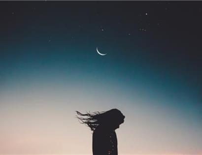 Woman in front of stars