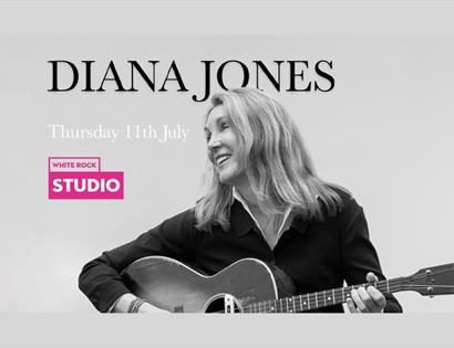 Diana Jones playing guitar